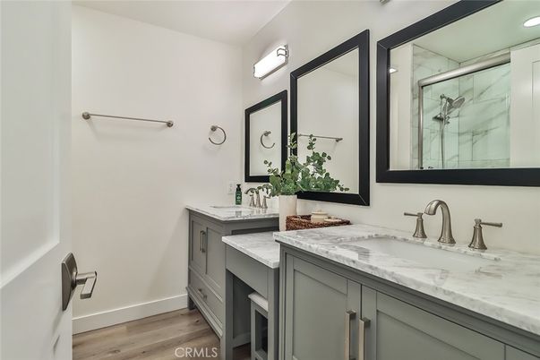 Bathroom, Dual Sink Vanities, Interior, Recessed Lighting, Wood Texture Flooring