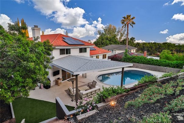 Exterior, Pool, Solar Panels