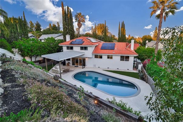 Exterior, Pool, Solar Panels
