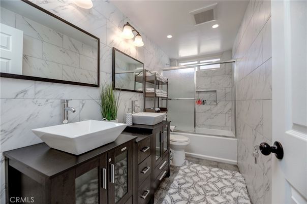 Bathroom, Dual Sink Vanities, Glass Shower, Interior, Marble Walls, Recessed Lighting