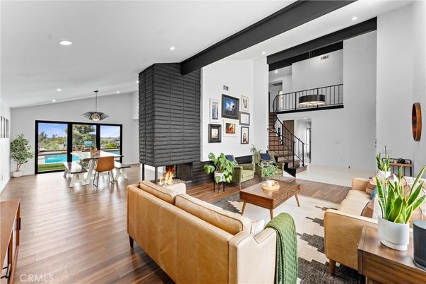 Dining room, Fireplace, Interior, Living room, Pendant Lights, Recessed Lighting, Wood Texture Flooring