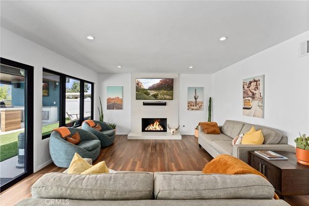 Fireplace, Interior, Living room, Recessed Lighting, Wood Texture Flooring