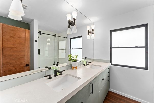 Bathroom, Dual Sink Vanities, Glass Shower, Interior, Wood Texture Flooring