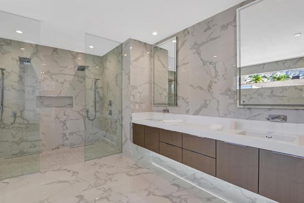 Bathroom, Dual Sink Vanities, Glass Shower, Interior, Marble, Marble Walls, Recessed Lighting