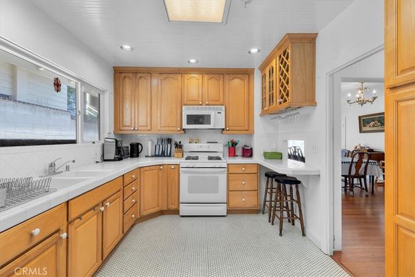 Chandelier, Interior, Kitchen, Recessed Lighting, Tile Countertops, Wood Texture Flooring