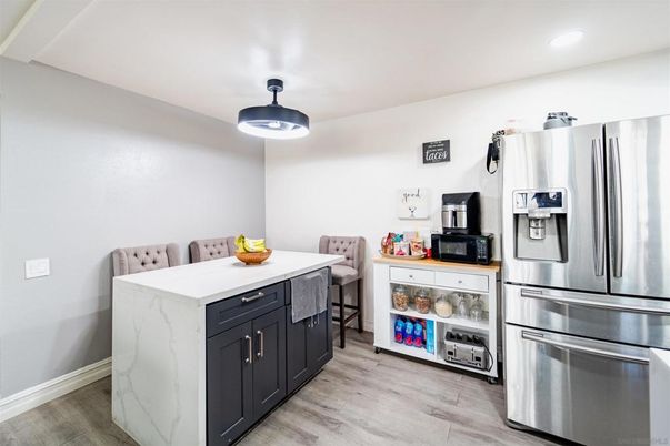 Dining room, Interior, Kitchen, Recessed Lighting, Stainless Steel Appliances, Wood Texture Flooring