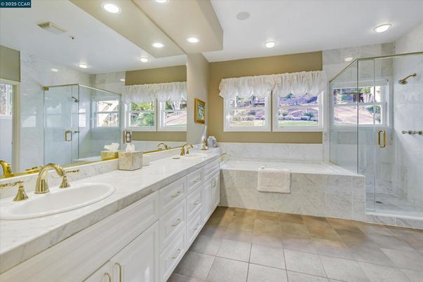 Bathroom, Dual Sink Vanities, Glass Shower, Interior, Marble Walls, Recessed Lighting
