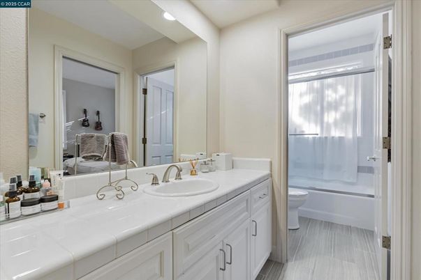 Bathroom, Dual Sink Vanities, Interior, Recessed Lighting, Tile Countertops