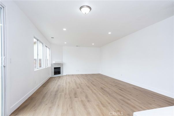 Empty room, Fireplace, Interior, Recessed Lighting, Wood Texture Flooring