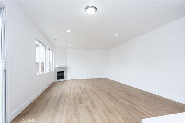 Empty room, Fireplace, Interior, Recessed Lighting, Wood Texture Flooring