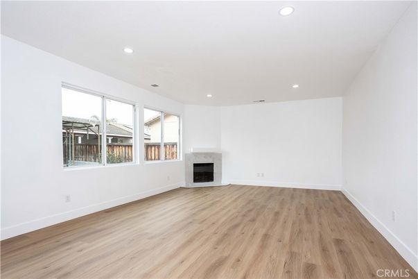 Empty room, Fireplace, Interior, Recessed Lighting, Wood Texture Flooring