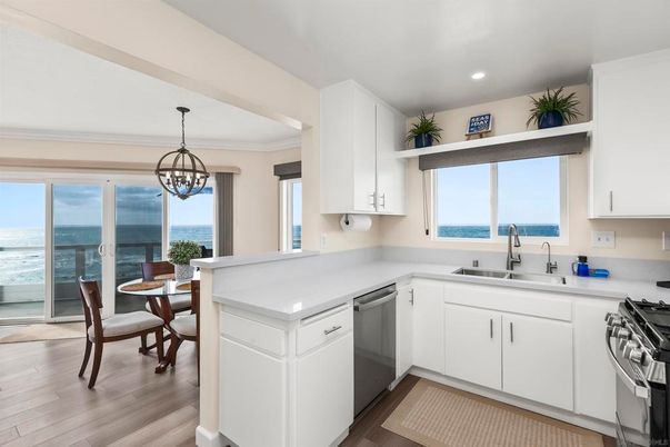 Chandelier, Dining room, Interior, Kitchen, Recessed Lighting, Stainless Steel Appliances, Water, Wood Texture Flooring