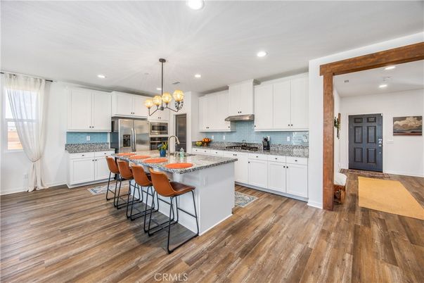 Chandelier, Interior, Kitchen, Recessed Lighting, Stainless Steel Appliances, Wood Texture Flooring
