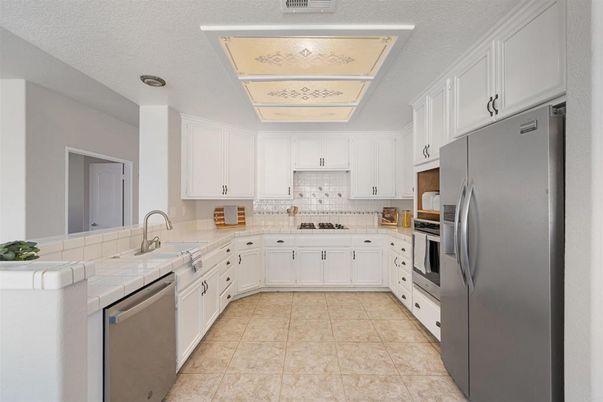 Interior, Kitchen, Stainless Steel Appliances, Tile Countertops