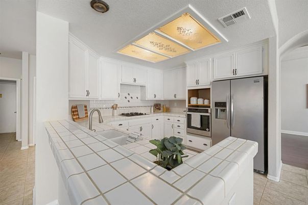 Interior, Kitchen, Stainless Steel Appliances, Tile Countertops
