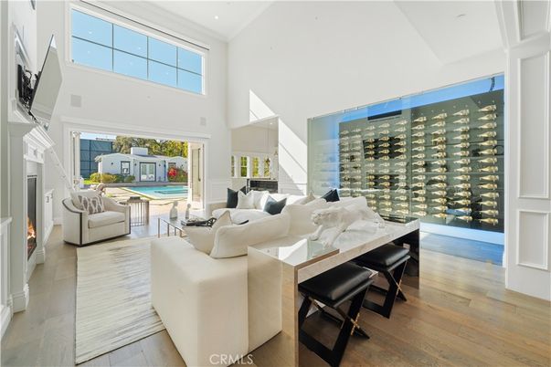 Fireplace, Interior, Living room, Recessed Lighting, Wine Storage, Wood Texture Flooring