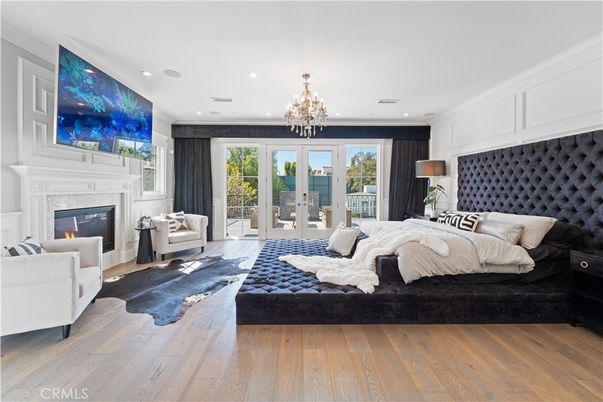 Bedroom, Chandelier, Fireplace, Interior, Recessed Lighting, Wood Texture Flooring