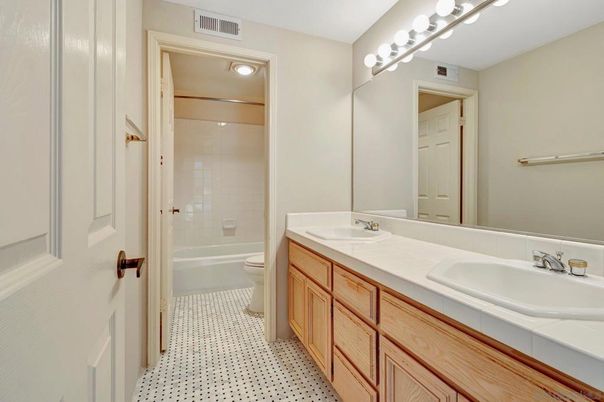 Bathroom, Dual Sink Vanities, Interior, Recessed Lighting, Tile Countertops
