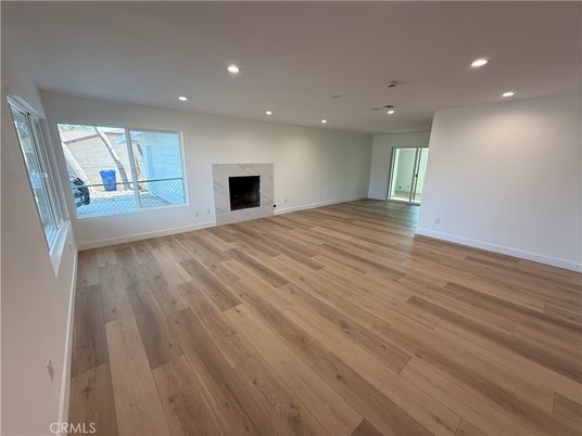 Empty room, Fireplace, Interior, Recessed Lighting, Wood Texture Flooring