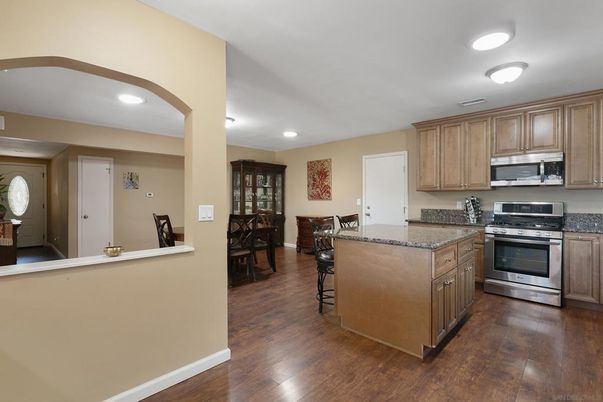 Dining room, Interior, Kitchen, Recessed Lighting, Stainless Steel Appliances, Wood Texture Flooring