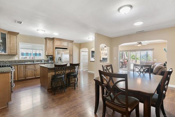 Dining room, Interior, Kitchen, Recessed Lighting, Stainless Steel Appliances, Wood Texture Flooring