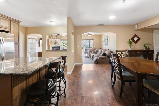 Dining room, Interior, Kitchen, Living room, Recessed Lighting, Stainless Steel Appliances, Wood Texture Flooring