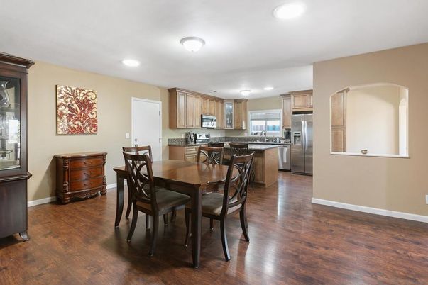 Dining room, Interior, Kitchen, Recessed Lighting, Stainless Steel Appliances, Wood Texture Flooring