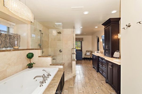 Bathroom, Dual Sink Vanities, Glass Shower, Interior, Recessed Lighting, Wood Texture Flooring