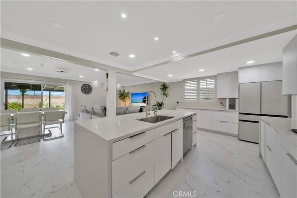 Dining room, Interior, Kitchen, Living room, Marble, Recessed Lighting, Stainless Steel Appliances
