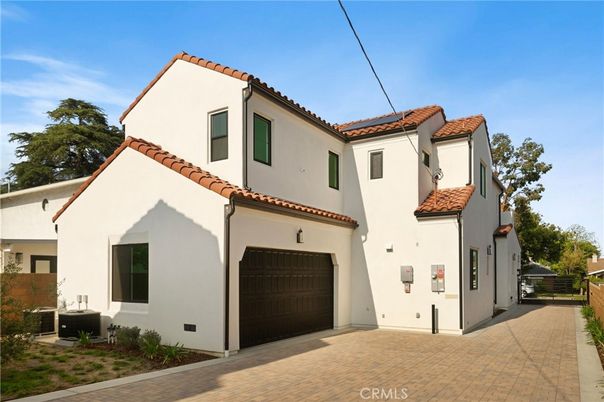 Attached, Exterior, Facade, Spanish Mediterranean