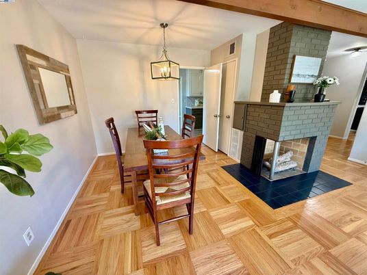 Dining room, Fireplace, Interior, Pendant Lights, Stone Walls, Wood Texture Flooring
