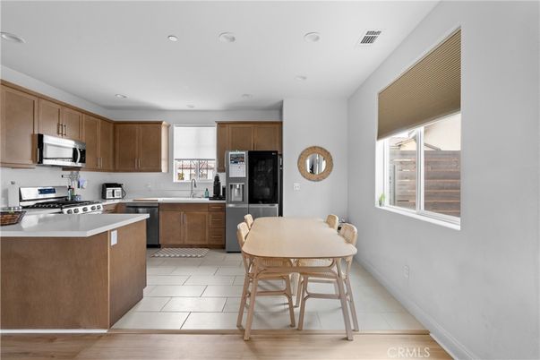 Dining room, Interior, Kitchen, Recessed Lighting, Stainless Steel Appliances, Wood Texture Flooring