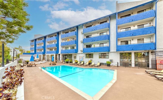 Exterior, Facade, Pool, Condo Building