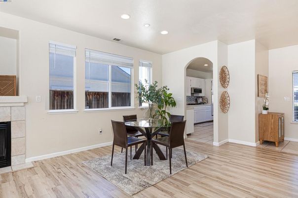 Dining room, Fireplace, Interior, Kitchen, Recessed Lighting, Wood Texture Flooring