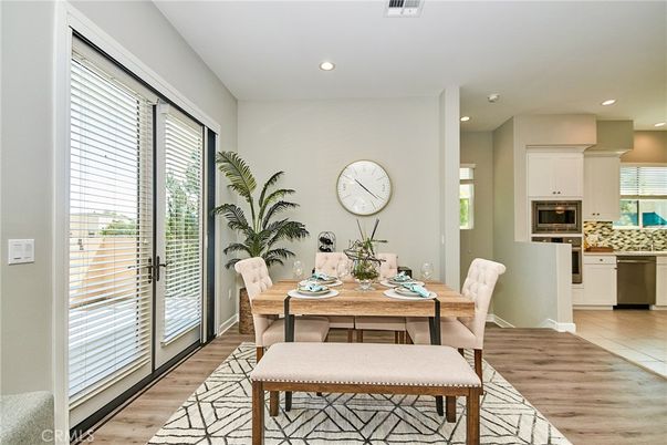 Dining room, Interior, Kitchen, Recessed Lighting, Stainless Steel Appliances, Wood Texture Flooring