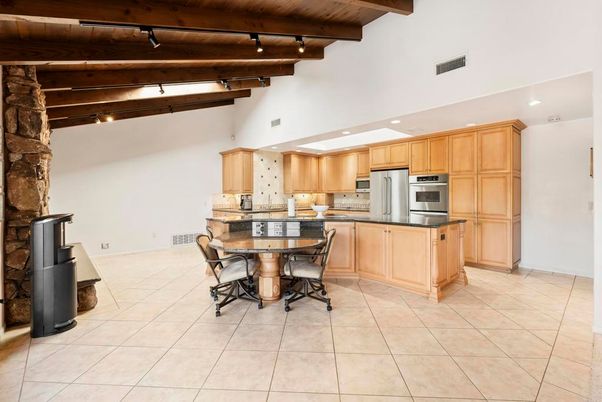 Chandelier, Dining room, Fireplace, Interior, Kitchen, Pendant Lights, Recessed Lighting, Stone Walls, Wooden Beams, Wooden Ceilings