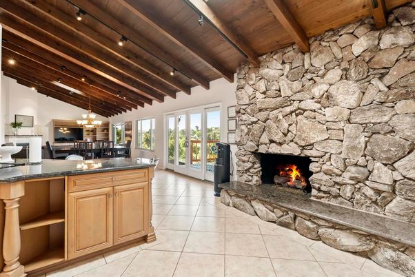 Chandelier, Dining room, Fireplace, Interior, Kitchen, Pendant Lights, Recessed Lighting, Stone Walls, Wooden Beams, Wooden Ceilings