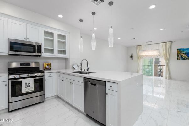 Interior, Kitchen, Marble, Pendant Lights, Recessed Lighting, Stainless Steel Appliances