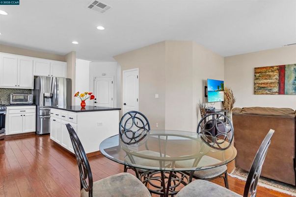 Dining room, Interior, Kitchen, Recessed Lighting, Stainless Steel Appliances, Wood Texture Flooring