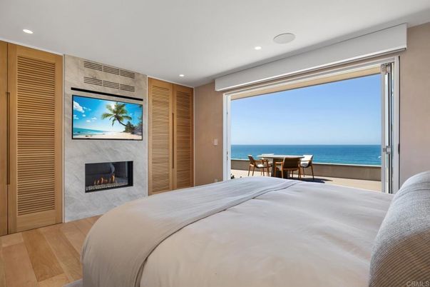 Bedroom, Fireplace, Interior, Recessed Lighting, Water, Wood Texture Flooring