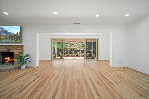 Empty room, Fireplace, Interior, Recessed Lighting, Wood Texture Flooring