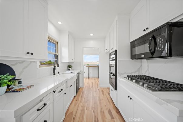 Interior, Kitchen, Marble Walls, Recessed Lighting, Wood Texture Flooring