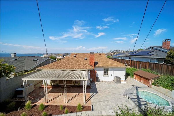 Exterior, Pool, Solar Panels
