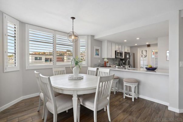 Dining room, Interior, Kitchen, Pendant Lights, Recessed Lighting, Stainless Steel Appliances, Wood Texture Flooring