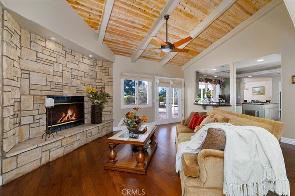 Fireplace, Interior, Living room, Recessed Lighting, Stone Walls, Wooden Ceilings, Wood Texture Flooring