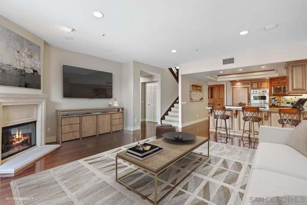 Fireplace, Interior, Kitchen, Living room, Recessed Lighting, Stainless Steel Appliances, Wood Texture Flooring