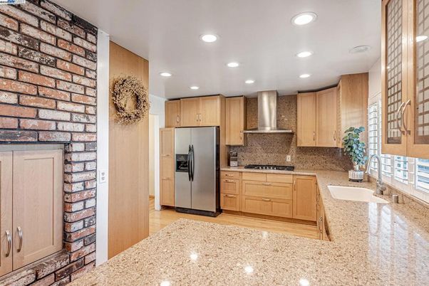 Interior, Kitchen, Recessed Lighting, Stainless Steel Appliances, Stone Walls, Wood Texture Flooring
