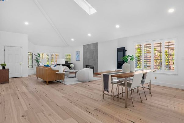 Dining room, Fireplace, Interior, Living room, Recessed Lighting, Wood Texture Flooring