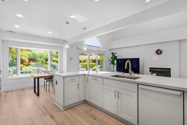 Dining room, Fireplace, Interior, Kitchen, Pendant Lights, Recessed Lighting, Wood Texture Flooring