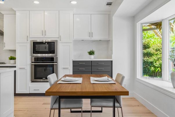 Dining room, Interior, Kitchen, Recessed Lighting, Stainless Steel Appliances, Wood Texture Flooring